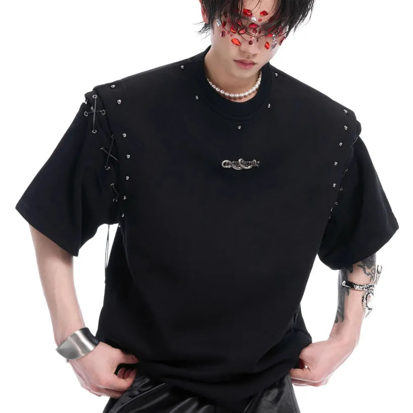 Black deconstructed short sleeve T-shirt with lace-up sides and cutout detailing on a mannequin.
