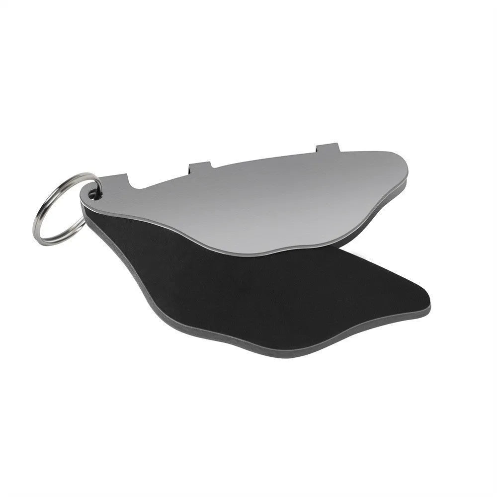 Mountain bike scratch-proof disc brake pads in black and orange colours with adjustment flap.