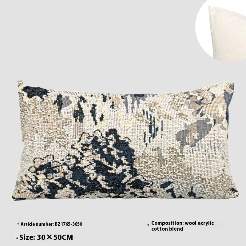 Antique blue wool blend decorative pillow with abstract flower pattern in square and waist pillow sizes.
