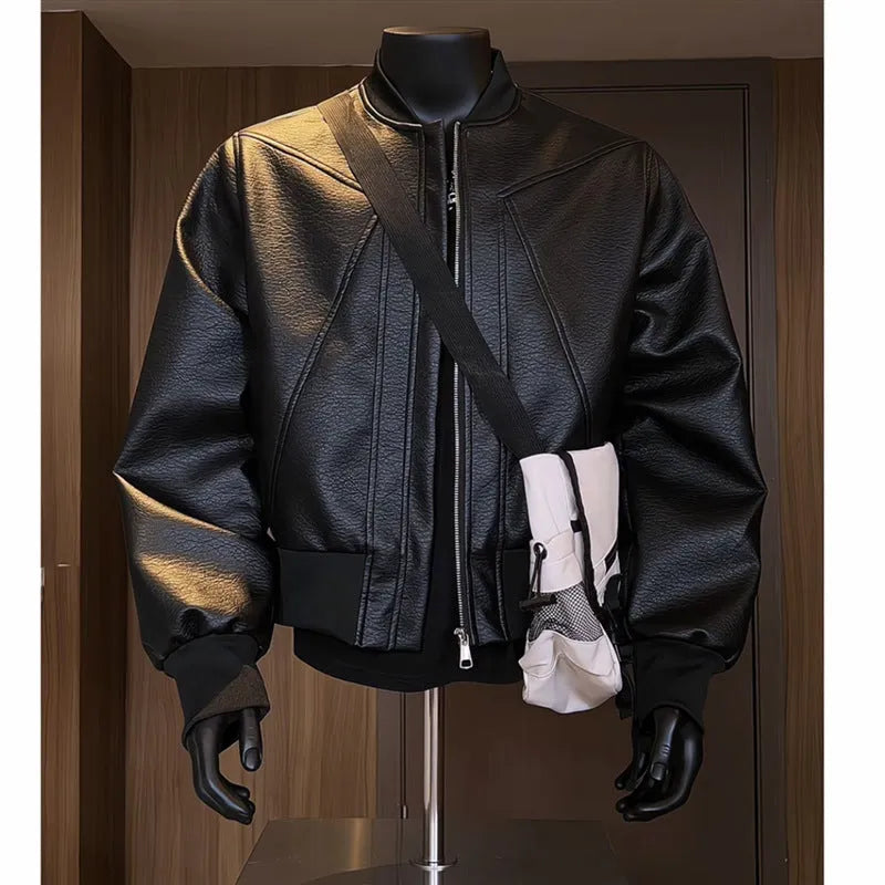 Men's extended length black PU leather jacket with egg white litchi grain texture and slim fit styling