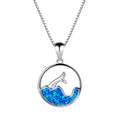 White gold electroplated copper necklace with a geometric blue opal fishtail pendant.