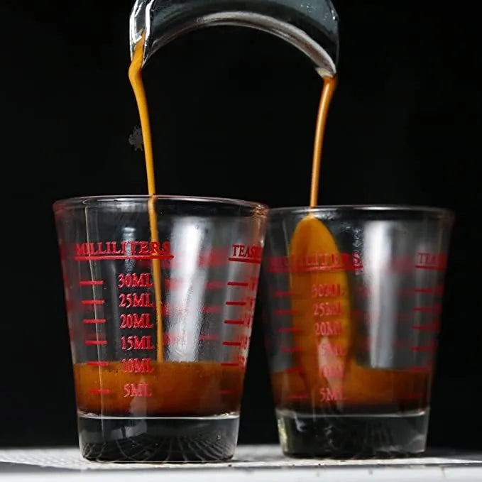 Mini retro glass measuring cup with scale showing 30ml capacity in solid colour