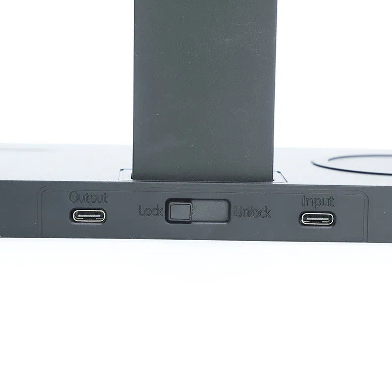 Black wireless charging station for phone, watch and headphones with indicator lights