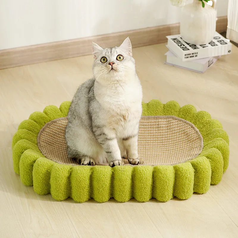 Green oval cat scratch pad bowl with sisal surface measuring 65cm