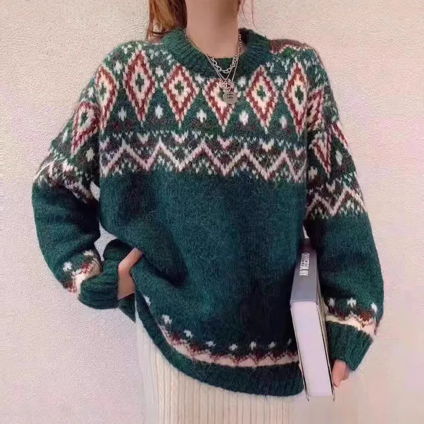 A loose-fitting striped knitted pullover top with long sleeves, shown in red and white colour options.