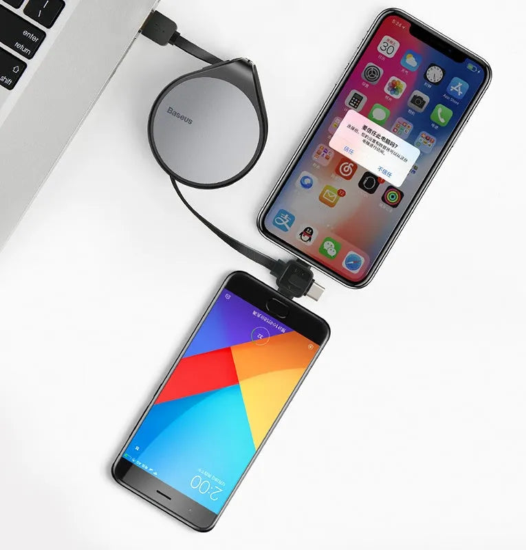Black telescopic three-in-one fast charging cable extended to 1 metre with Lightning, USB-C, and micro-USB connectors.