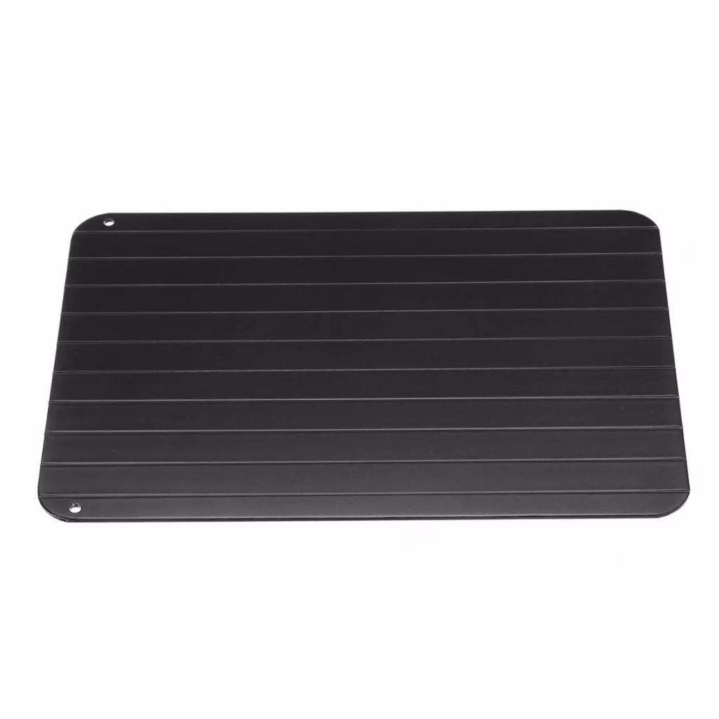 Black aluminium defrosting tray for thawing frozen meat without microwave