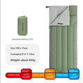 Four seasons portable camping sleeping bag in swamp green colour with storage bag.