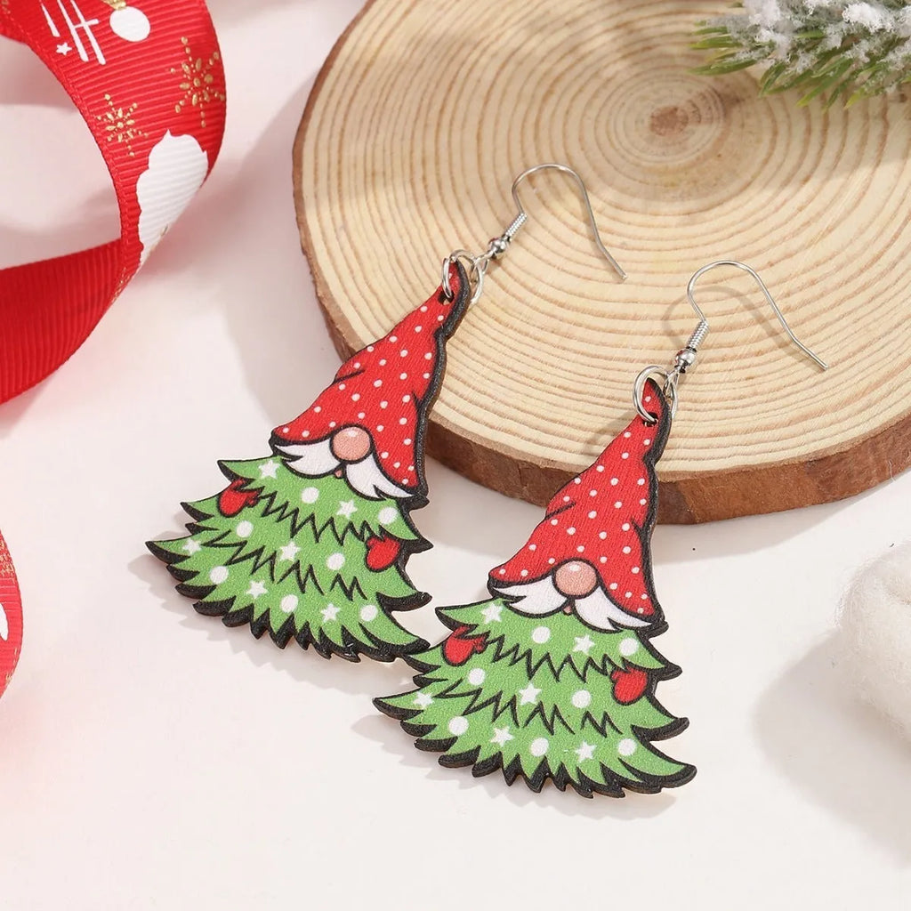 Wooden Christmas earrings with printed Santa Claus and geometric designs in Christmas tree and snowman styles
