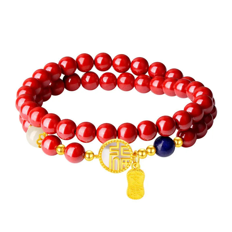 Close-up of a women's 925 sterling silver bracelet with a purple gold sandstone blessing charm and 6mm beads.