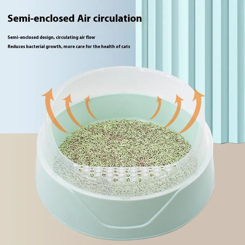 Round cat litter box in mint green colour, made from white PP plastic.