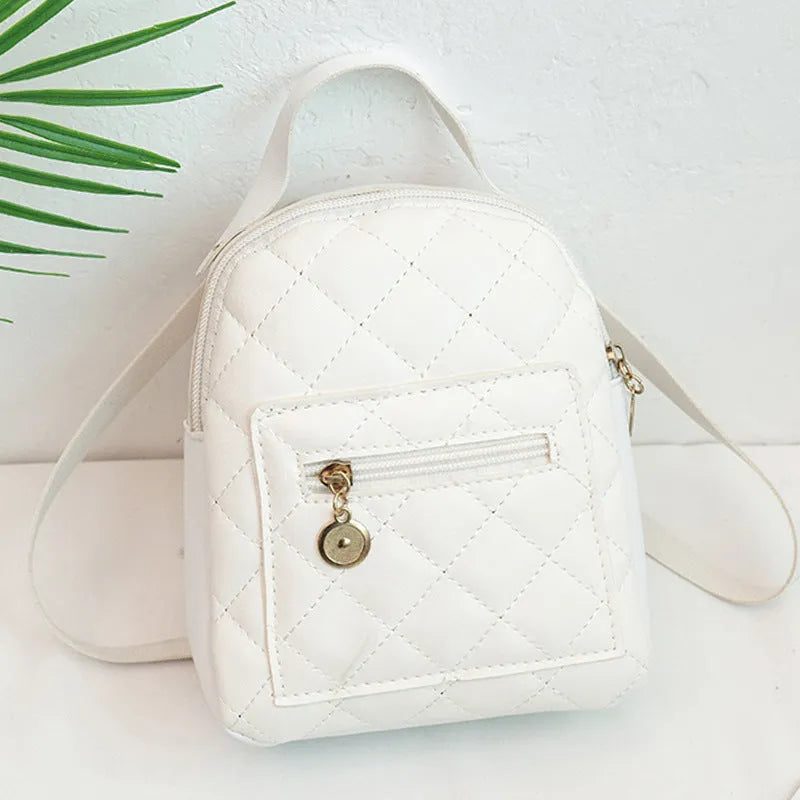 Girls' hard square embroidered backpack in white colour showing front design and soft handle.