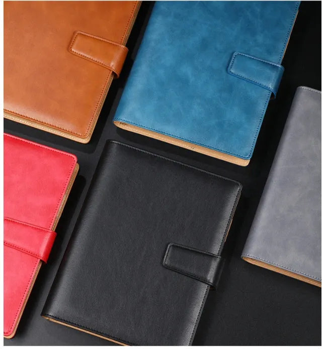 Hardcover A5 leather notebook with buckle closure in five colour options showing interior Daolin paper