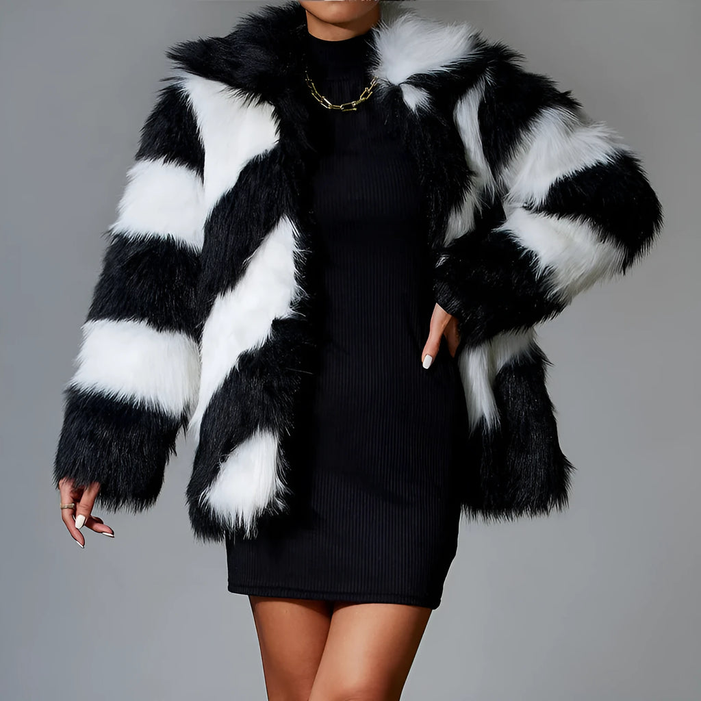 Women's faux fur coat with contrast lapel and detachable fur collar on a hanger.