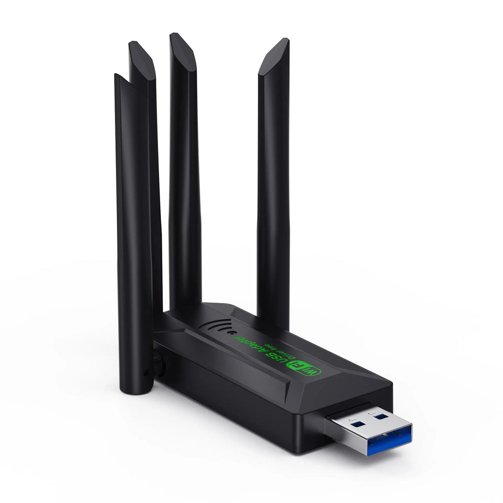 Black external USB network transmitter device with four extended antennas.