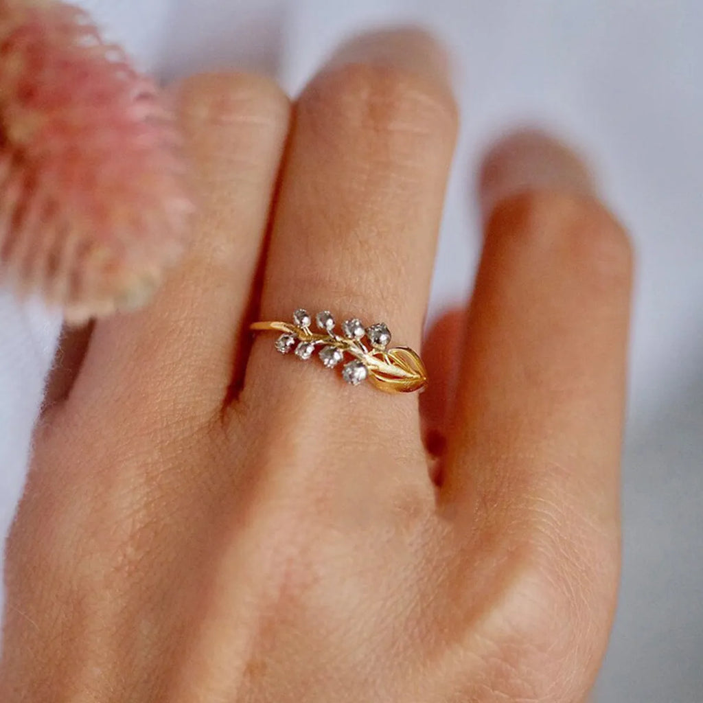 S925 pure silver bell orchid ring with micro inlay, champagne gold finish, on white background