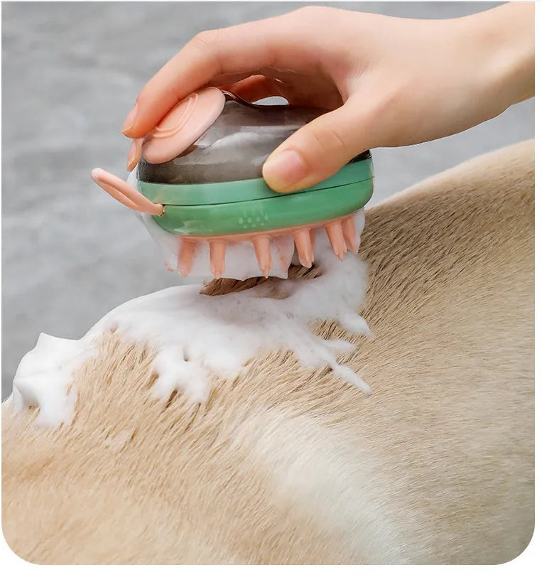 Blue pet grooming brush with integrated shampoo dispenser for bath time use with cats and dogs