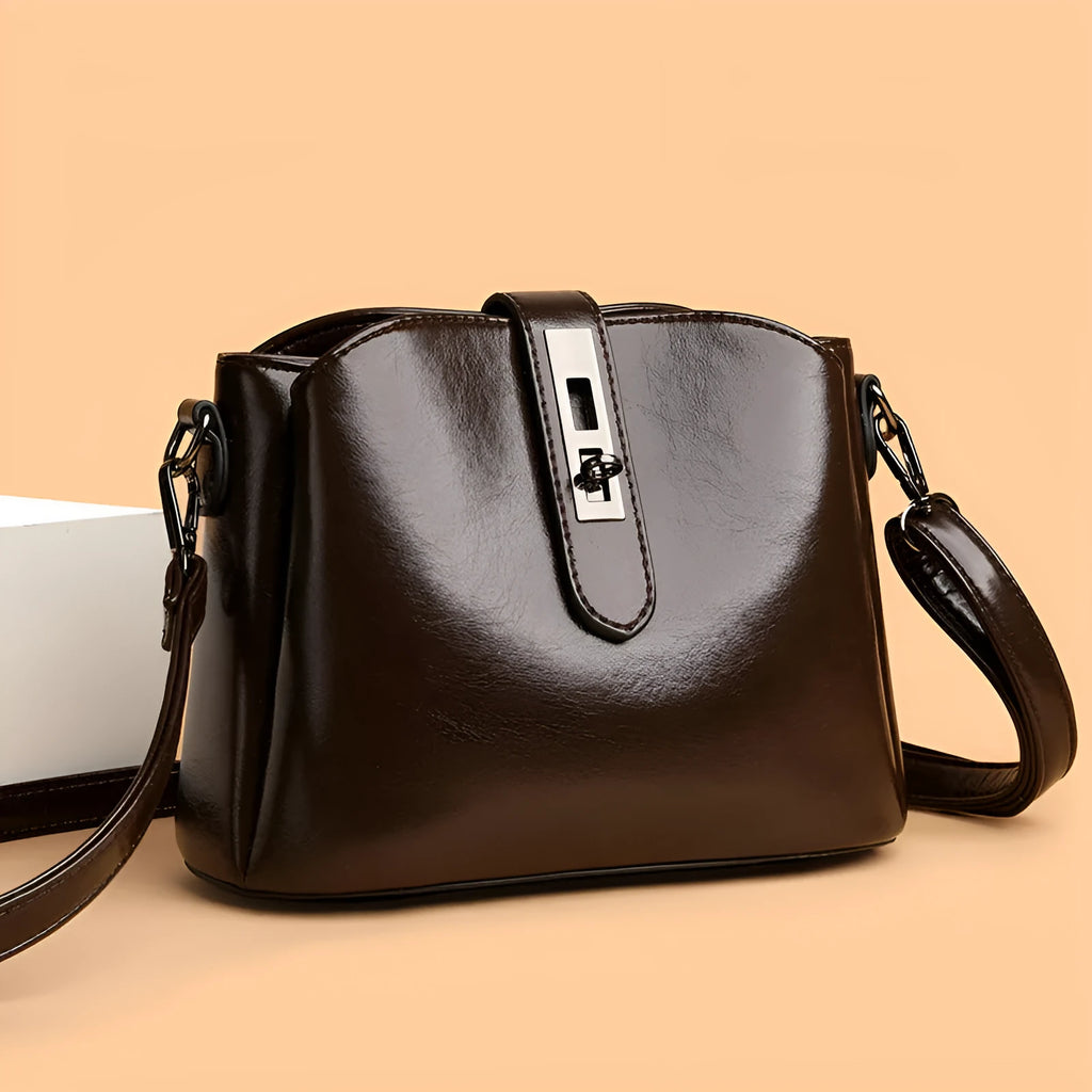 Women's retro fashion messenger bag in PU with sandwich pocket, available in black, brown, and white