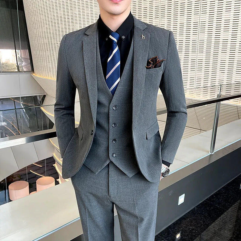 Men's slim fit British style business suit in black cotton blend fabric with adhesive interlining construction