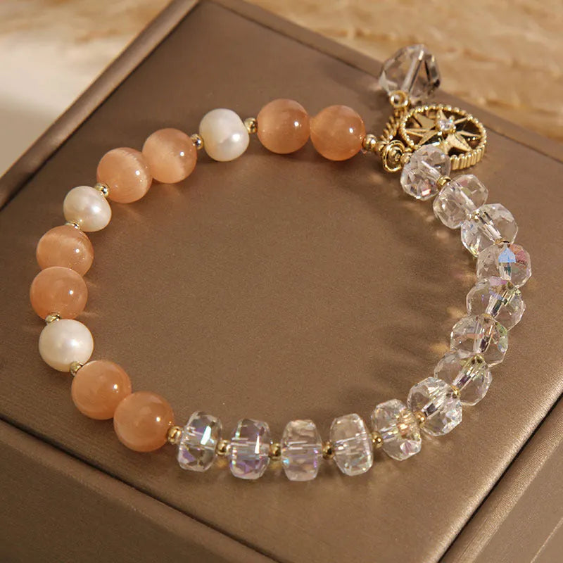 Gold-plated women's bracelet with orange crystal eight Awn star design