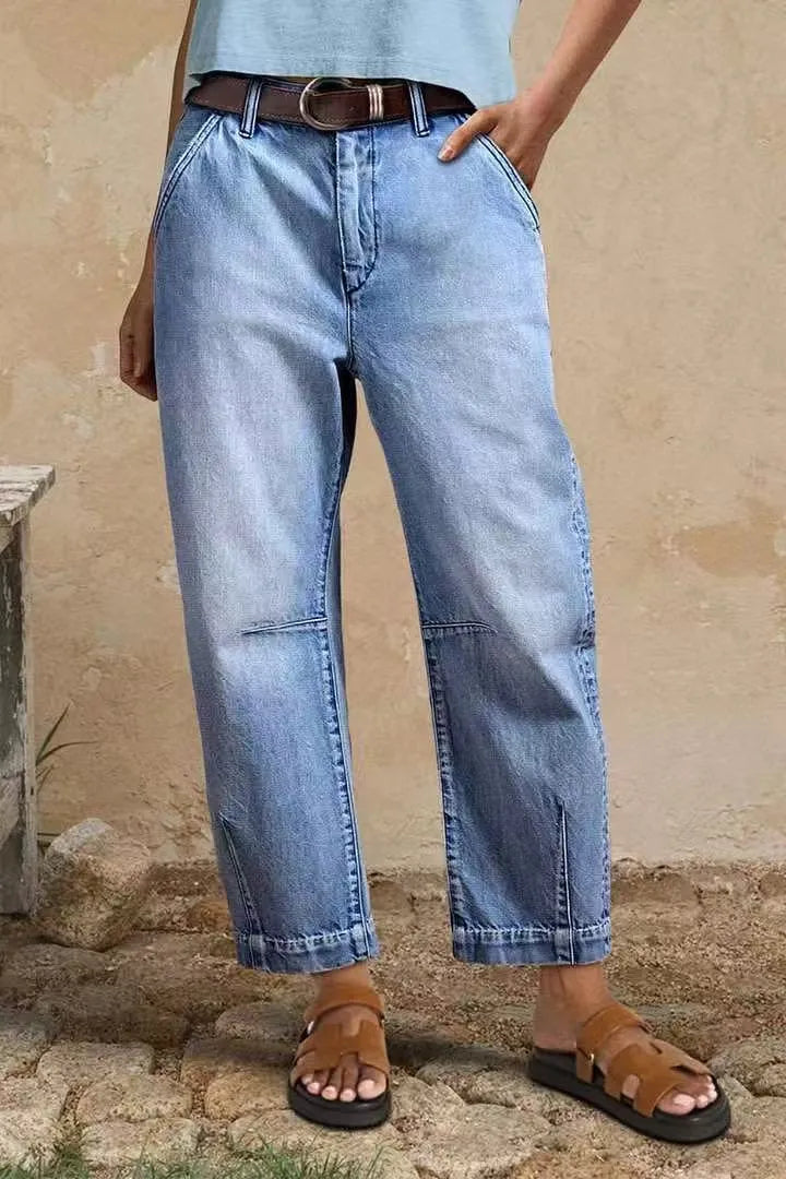 Casual loose jeans trousers in light blue denim with washed finish
