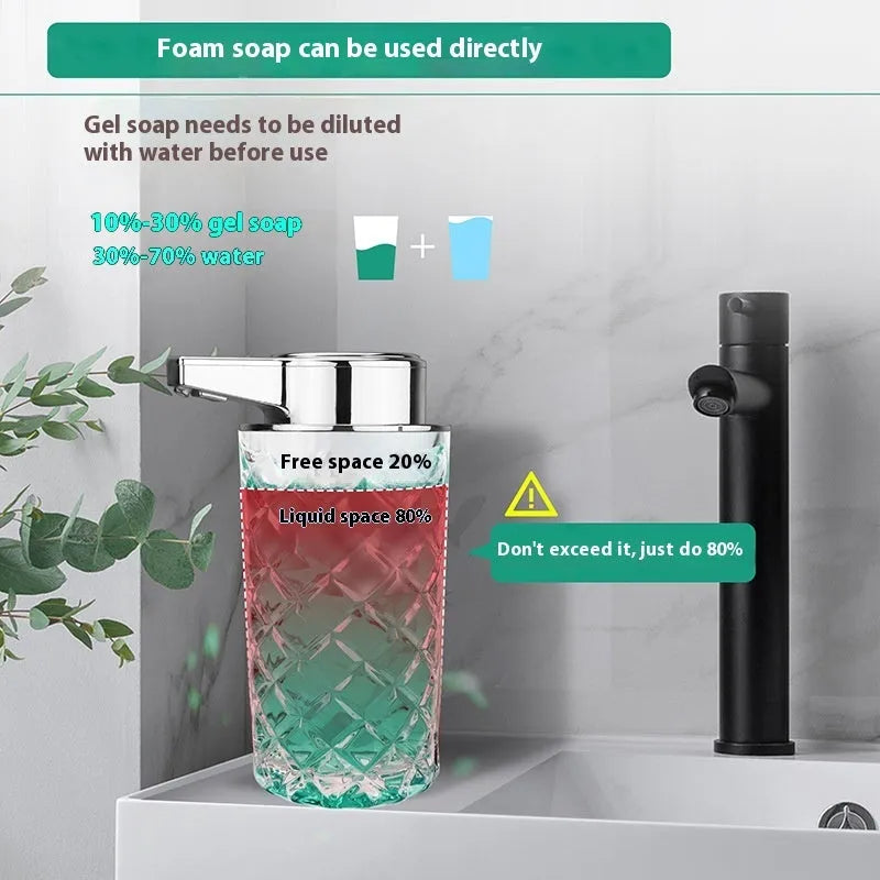 Silver automatic soap dispenser with sensor and USB Type-C charging port on a bathroom countertop