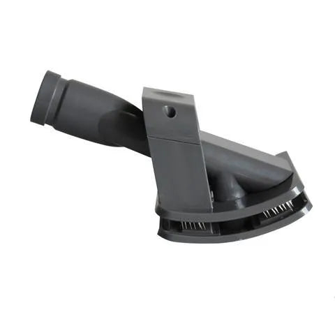 Deep grey pet grooming brush tool with vacuum attachment, 17 x 10 cm, on a plain background
