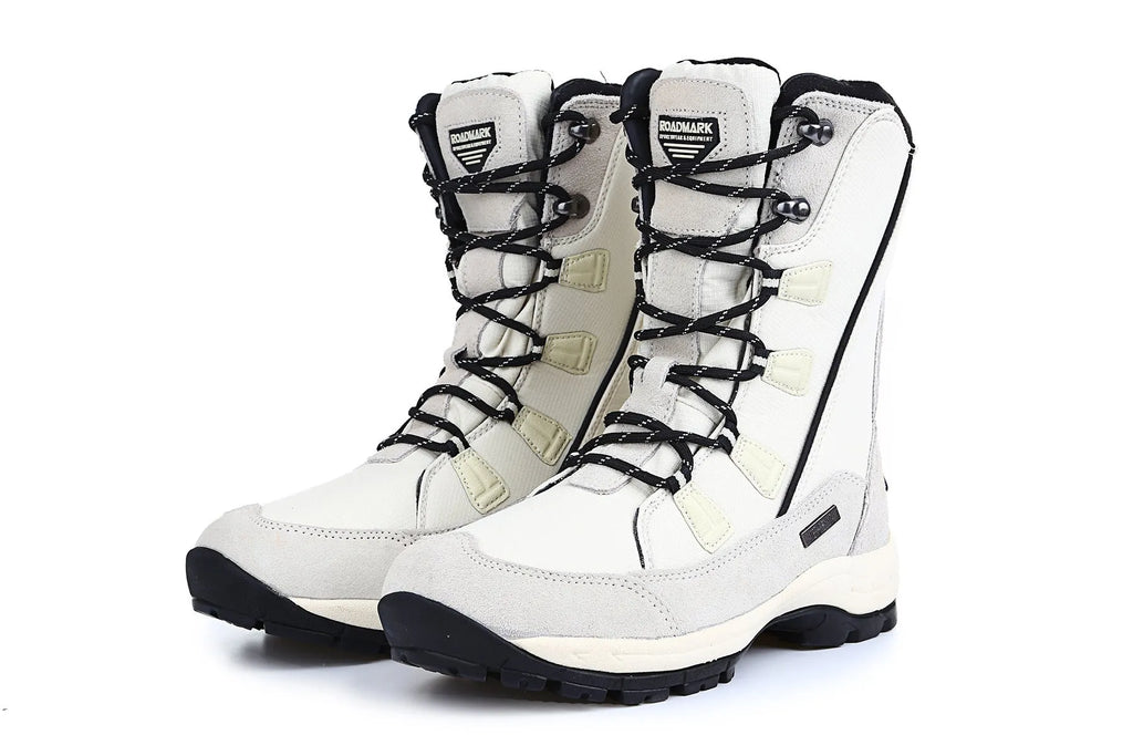 Women's black thermal snow boots with genuine leather uppers and a non-slip rubber sole.