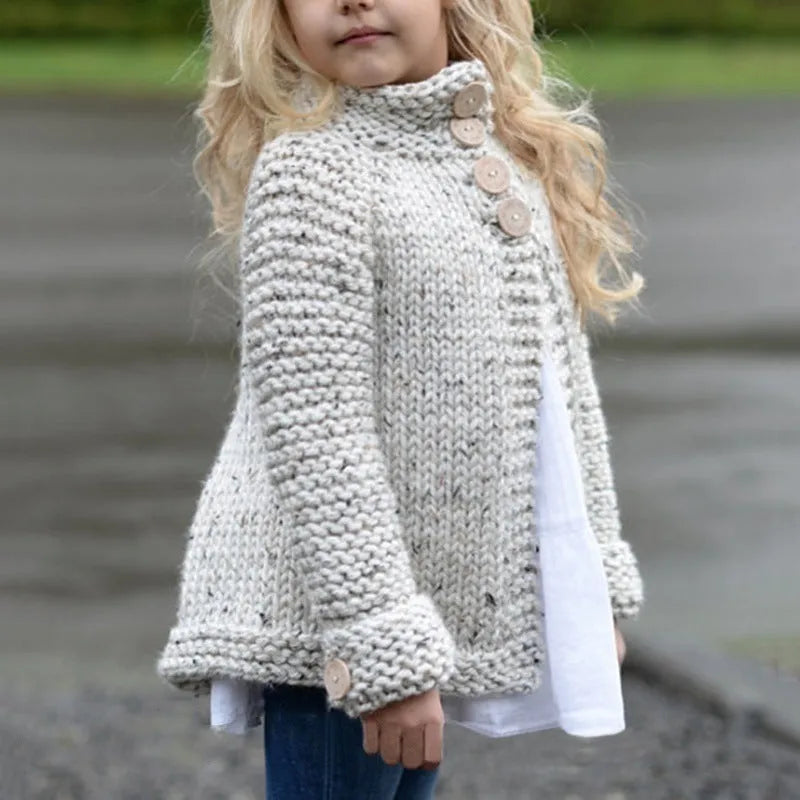 Beige long sleeve girls cardigan sweater coat with single-breasted button closure.