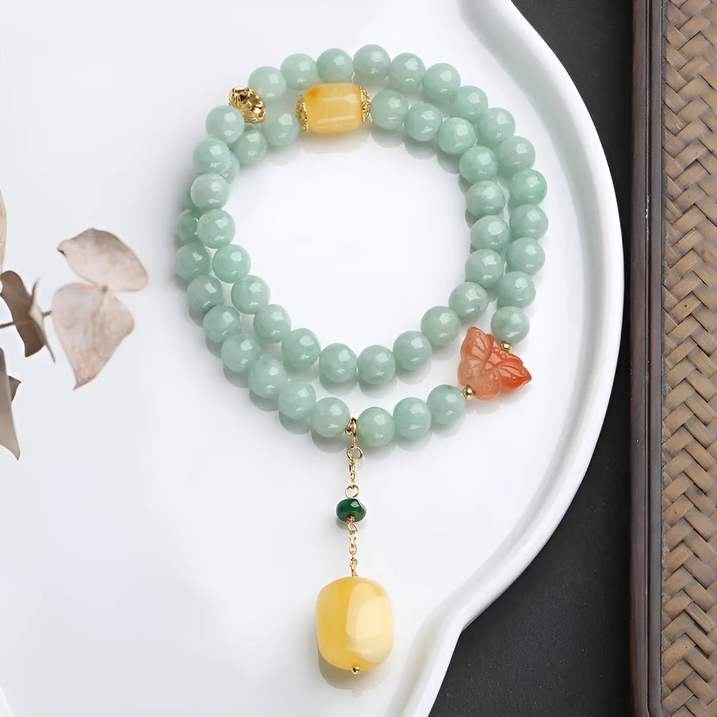Double-layer jade and beeswax bracelet with hanging barrel beads and retro geometry design