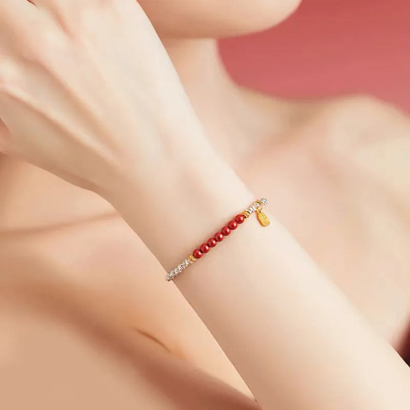 Silver electroplated couple bracelet with small geometric lucky beads measuring 16 cm