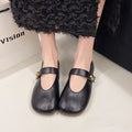 Women's casual flat heel buckle pumps in black with round toe and belt buckle detail