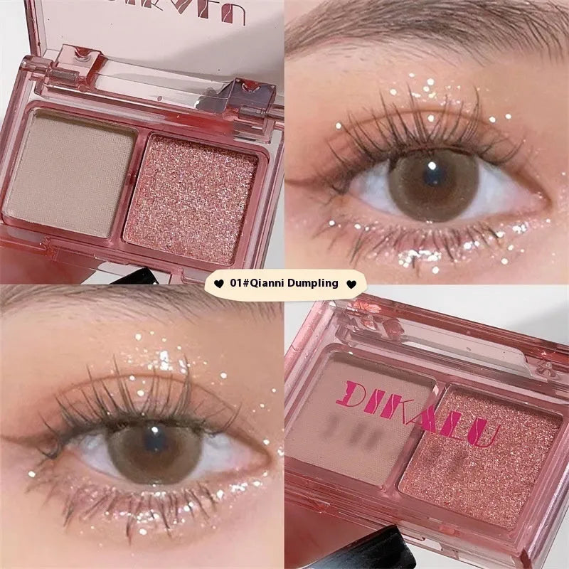 Cool two-tone eye shadow plate showing pink and black matte shimmer colours in a standard cosmetic compact.