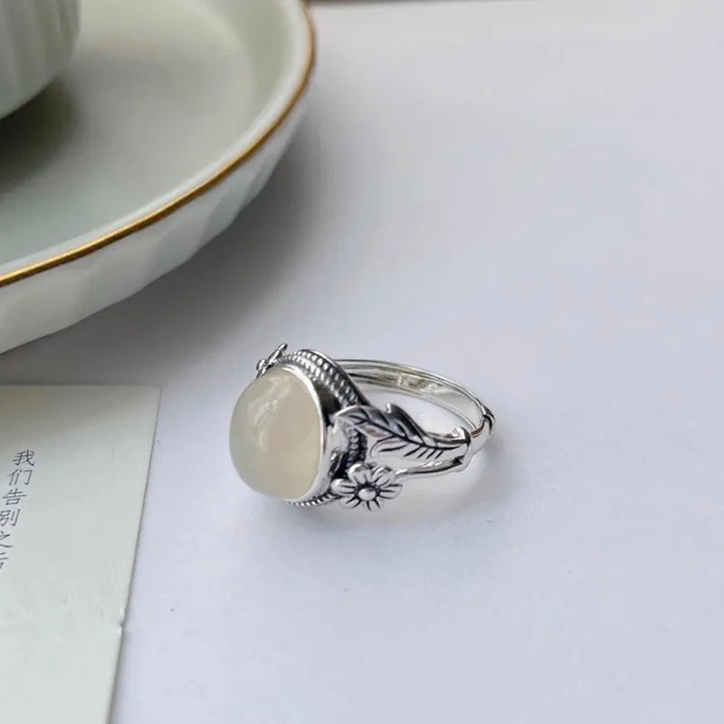 Adjustable vintage copper ring with white chalcedony colour and U-shaped open design