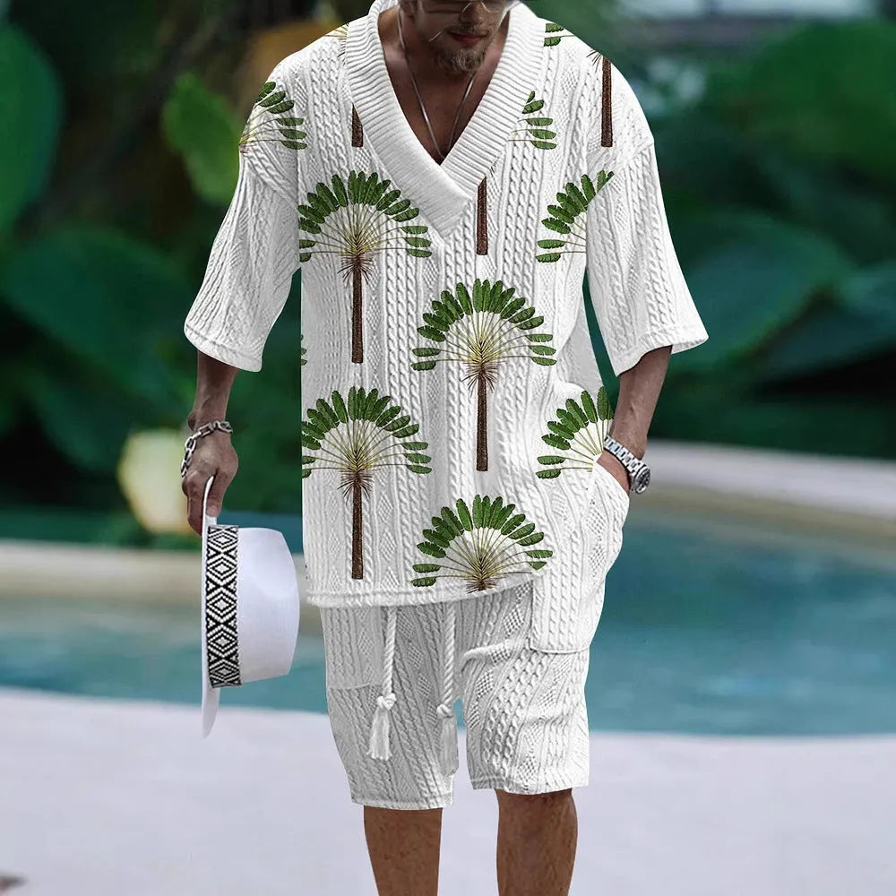 Loose casual short sleeve suit set in a light colour, showing the top and matching shorts laid flat.