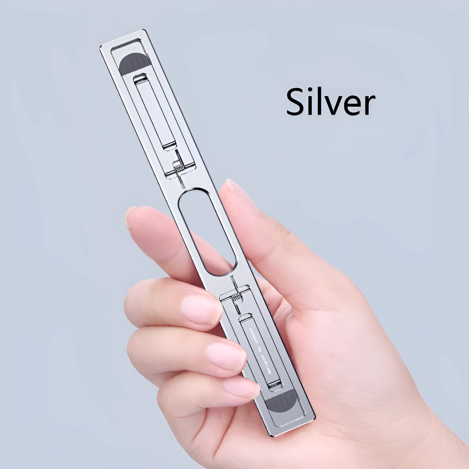 Aluminium laptop cooling bracket in silver colour with adjustable heightening base
