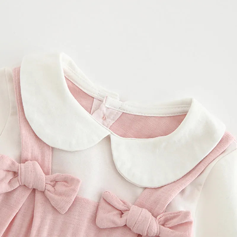 Pink baby girl embroidered long sleeve jumpsuit made from 100% cotton.