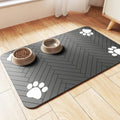 Blue diatom ooze pet floor mat under dog food and water bowls.