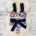 Women's blue and orange printed high waist bikini swimsuit two-piece set on a white background