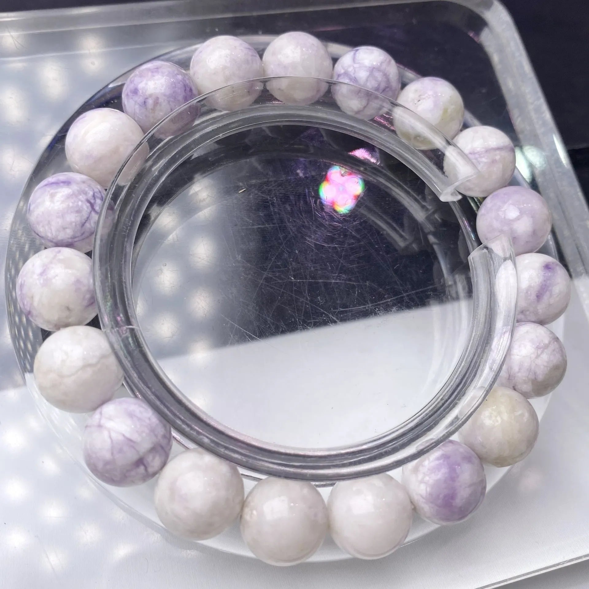 Women's natural purple turquoise bracelet showing different bead size options.