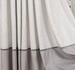 Custom blackout curtain panel showing fabric texture and hanging options
