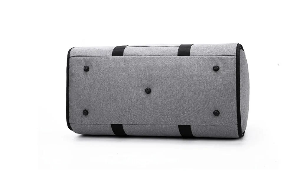 Medium cylinder-shaped travel holdall in oxford cloth, shown in one of four colour options.