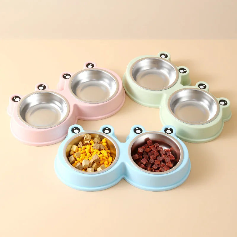 Stainless steel double compartment pet bowl for food and water on a silicone non-slip base.