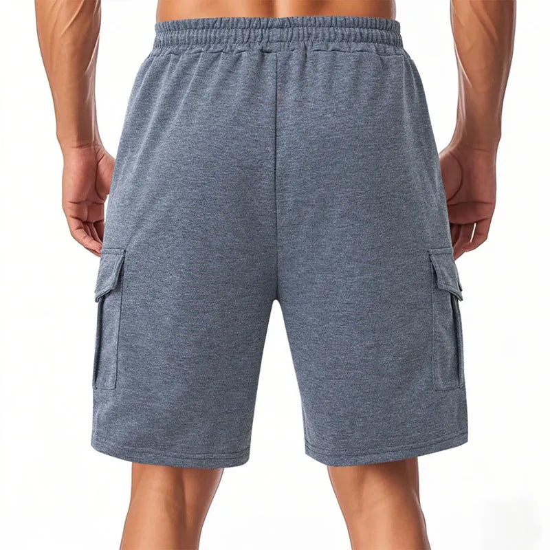 Men's loose fit cargo shorts in light grey with multiple pockets and terry fabric texture