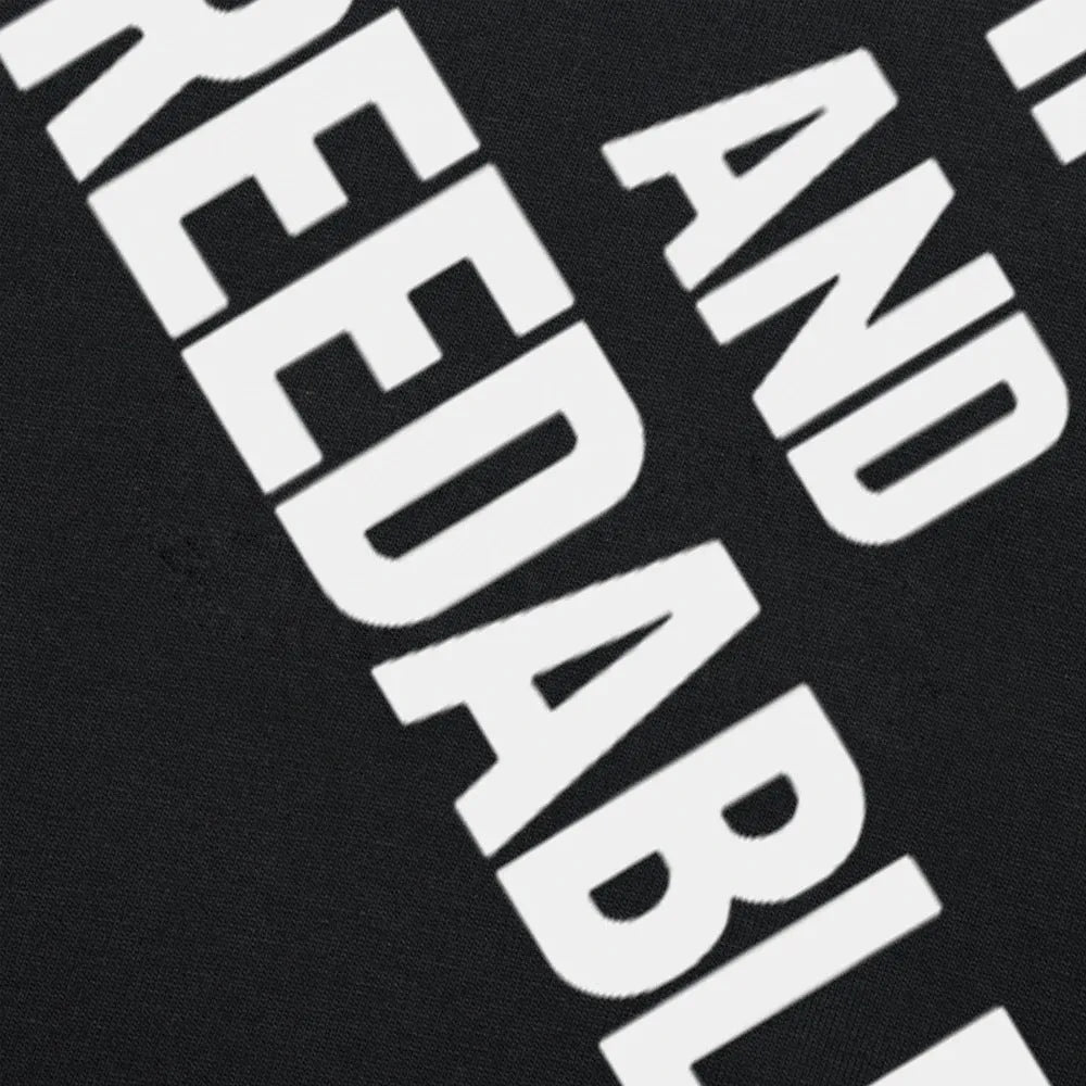 Cotton T-shirt with obedient and reproducible humour print in loose fit short sleeve design