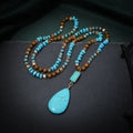 Turquoise blue heart-shaped water drop pendant necklace with mixed gem inlays on ball bead chain