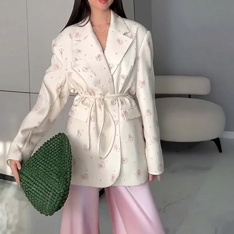 Women's collar lace-up waist-tight suit jacket in polyester, shown in apricot colour on a model.