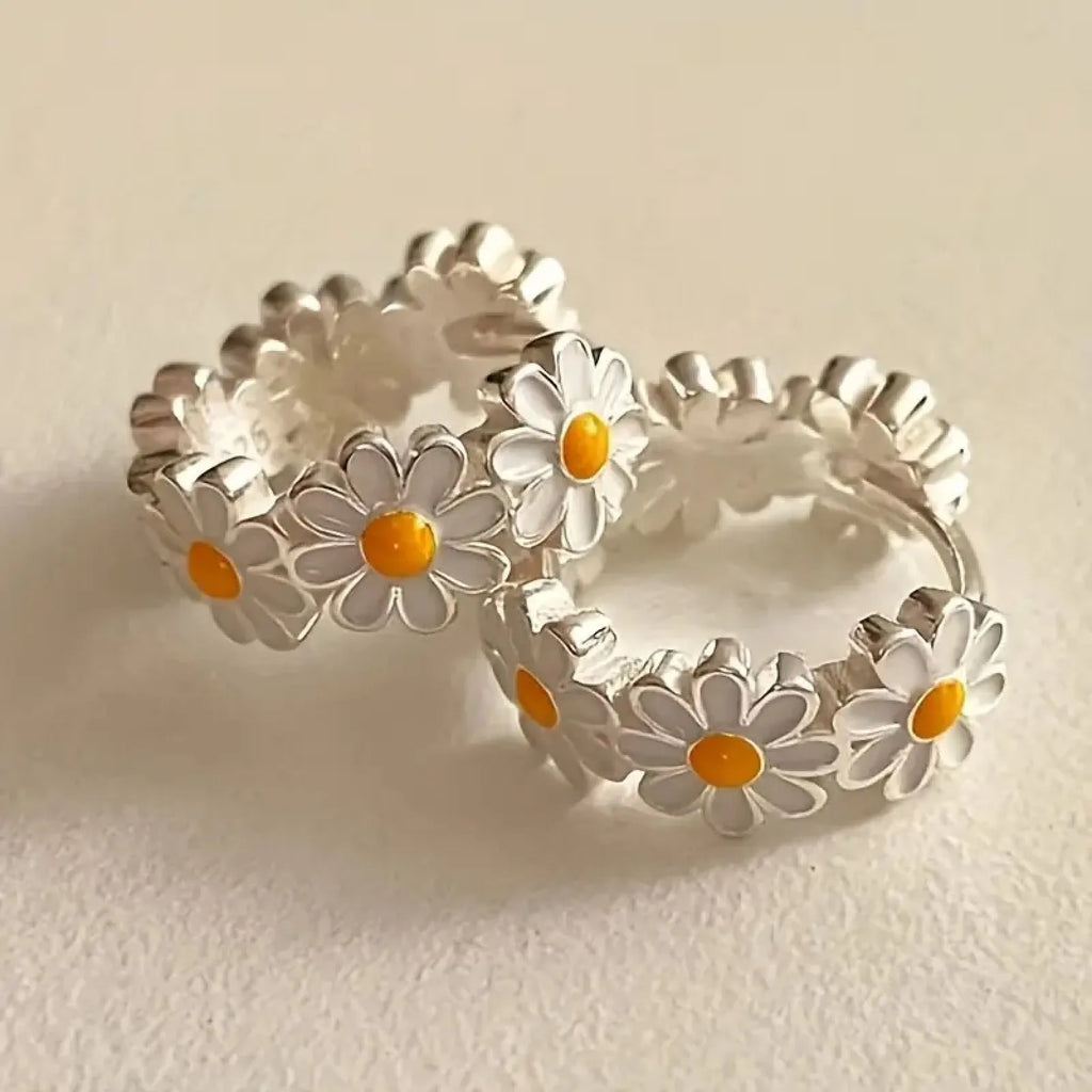 White electroplated daisy flower ring earrings with platinum gem detailing for fashion jewellery wear