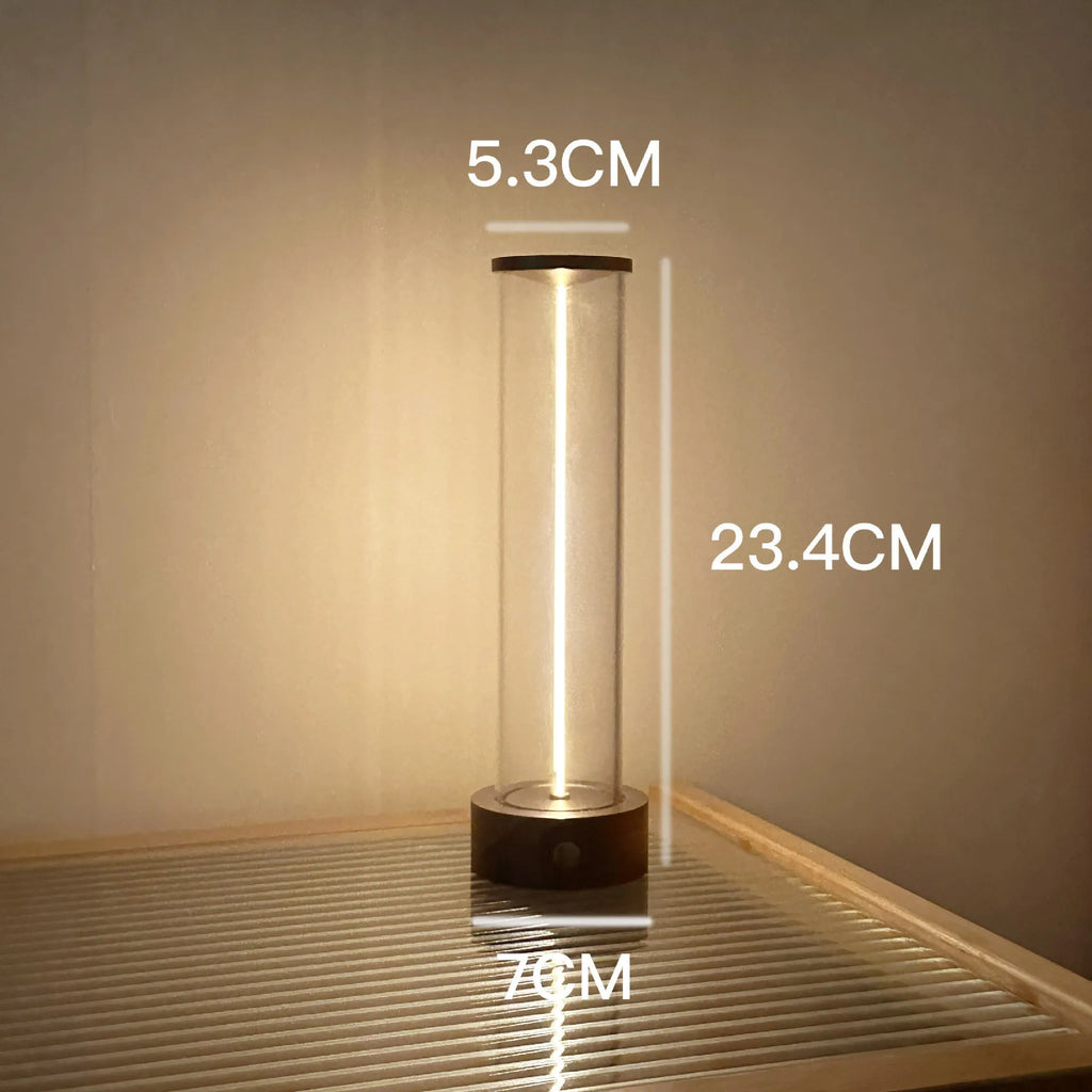Slender glass LED light strip with magnetic base for USB charging night light.