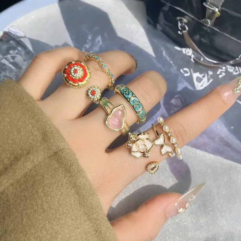 Close-up of a copper adjustable gourd ring with vintage oil-dripping finish and inlaid zircon stone.